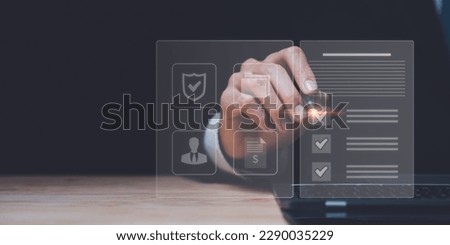 The auditor checks the documents and marks them as correct ,for certification and quality control that meets international standards ,Management of corporate data storage ,plan review process Royalty-Free Stock Photo #2290035229
