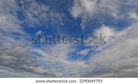 overcast rare cute white clouds in the summertime sky - photo of nature