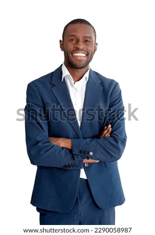 African businessman smiling in blue formal suit, looking at the camera, arms crossed, isolated over white background. Concept of business success and development Royalty-Free Stock Photo #2290058987