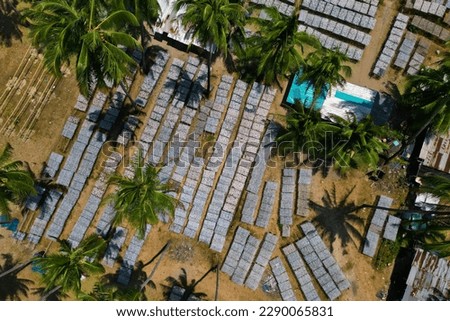 aerial view of fish farm during drying fish process