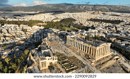 Aerial drone dramatic shot above unique Acropolis hill and the Parthenon an Unesco world heritage site, Athens historic centre, Attica, Greece