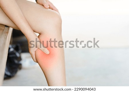 Women have pain in their legs or calves due to cramps. Concept of health problems. Royalty-Free Stock Photo #2290094043