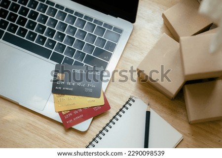 Picture of credit card and laptop computer. making online shopping online. Online shopping concept. Payment Transaction at Computer using Credit Card.