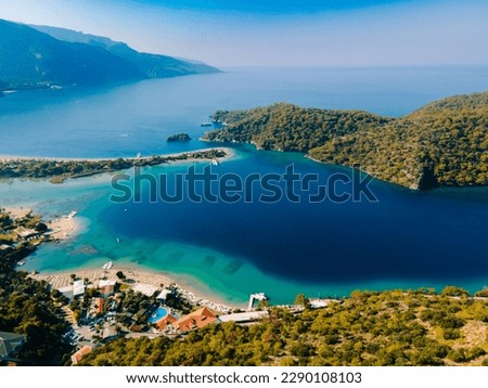 Aerial drone photo of Ölüdeniz, Fethiye, Turkey, showcasing the turquoise waters, picturesque coastline, and beautiful beaches of this popular summer destination. Royalty-Free Stock Photo #2290108103
