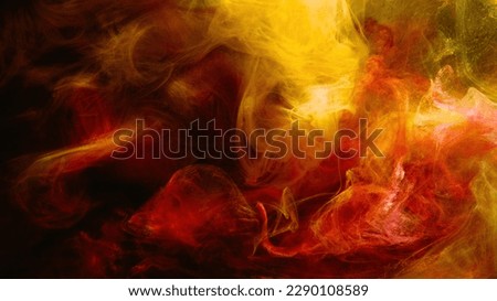 Color smoke. Paint water mix. Fire flame. Red yellow burning glowing glitter vapor texture on dark black abstract art background with free space. Royalty-Free Stock Photo #2290108589