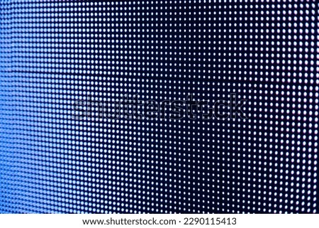 A close-up shot of a dead pixel on an LED screen.