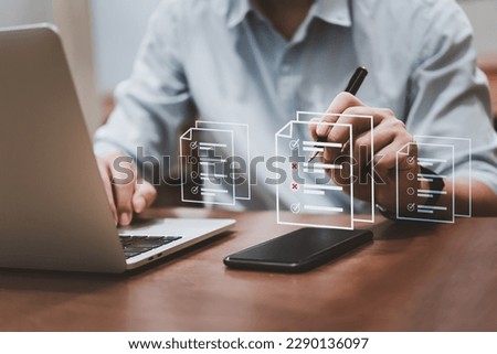 Online surveys and answering questions forms with checkbox icon on a digital window providing insightful work satisfaction information.Concept market research, customer feedback, and data collection. Royalty-Free Stock Photo #2290136097