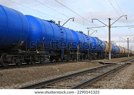 train with tanks transportation of gasoline by rail Royalty-Free Stock Photo #2290141323