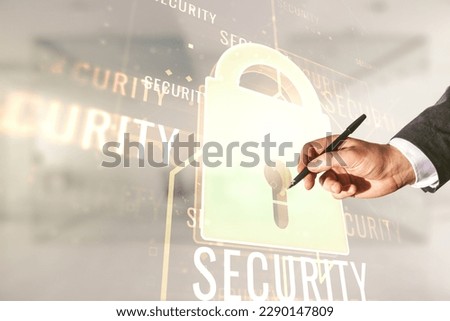 Man hand with pen working with virtual creative lock sketch with chip hologram on blurred office background, protection of personal data concept. Multiexposure