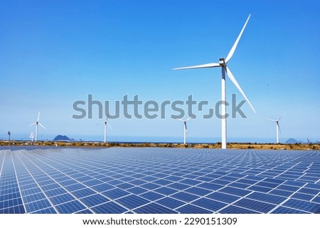 Solar panels and wind turbines for a decarbonized society Royalty-Free Stock Photo #2290151309