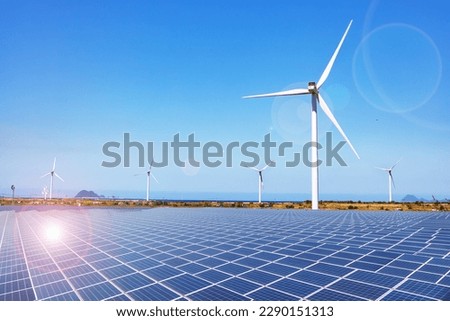 Solar panels and wind turbines for a decarbonized society Royalty-Free Stock Photo #2290151313