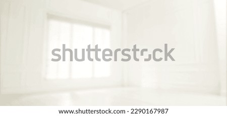 Empty room with white walls and large window, blurred view. Banner design