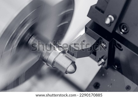 Auto CNC turning with robot drill milling factory with water splash. Concept metal machine industry background. Royalty-Free Stock Photo #2290170885