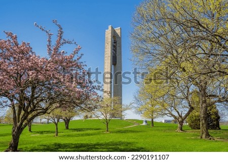 Springtime cherry blossoms line the paths near the Deeds Carillon monument in Dayton Ohio.  Royalty-Free Stock Photo #2290191107