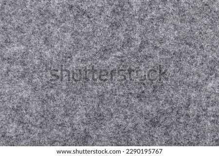 Warm grey felt as texture or background, square picture 