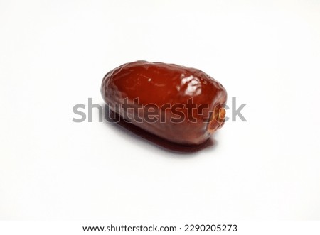 Close up of dried date fruit isolated on white background