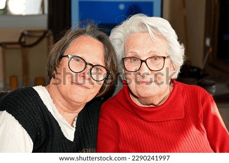 grandmother and great-grandmother looking from the front Royalty-Free Stock Photo #2290241997