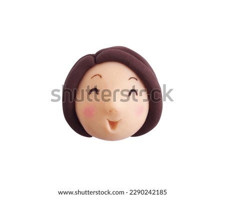 Woman's smile icon(This is a photo of a clay work)