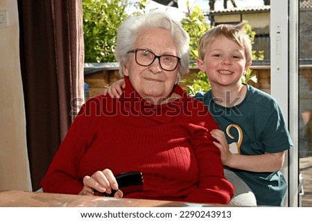 great grandmother with her grandson Royalty-Free Stock Photo #2290243913