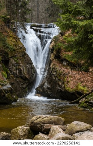 pictures of a mountain river with small waterfalls