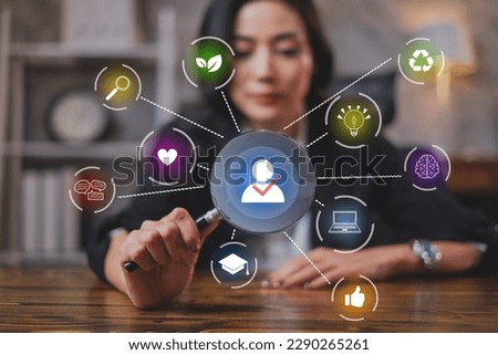 A Businesswoman or Human resources HR is searching for a right person for a job position. Concept of hiring, selection, interview, recruitment, soft skill and hard skill. Company employee match.  Royalty-Free Stock Photo #2290265261