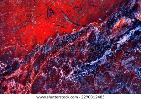 A remarkable multicolored jasper with patterns resembling those of watercolor drawing occurs in a deposit at Ural Mountains. Natural patterns and texture of slice of multicolored jasper stone surfaces