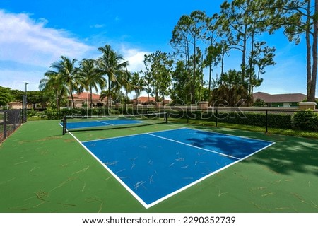 Pickle ball court in Florida sunshine Royalty-Free Stock Photo #2290352739