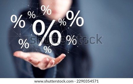 hand touches virtual percent icon