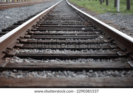 Rail Road tracks going into the horizon Royalty-Free Stock Photo #2290381537