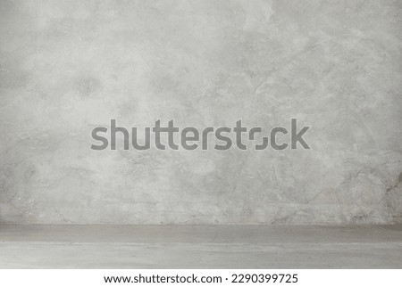 A concrete floor and wall for mock ups and artwork. Royalty-Free Stock Photo #2290399725
