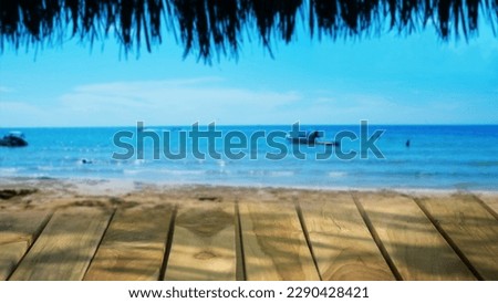 Wooden board on table with shadows, display podium for product mockups 3d trade show display advertising, Nature blurred sea and  background