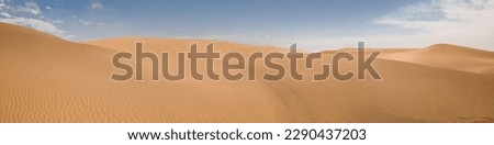 Panoramic view of the pristine sand dunes of Swakopmund Namibia Royalty-Free Stock Photo #2290437203