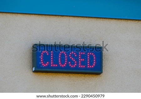 digital closed sign with  red led dots for letters