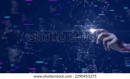 Digital cyber era technology concept. Human hand touching interconnected polygons of massive amounts of data glowing on a dark blue background. New innovations that are coming to change the world.
