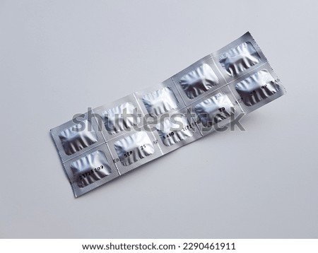 Medicine tablets on a white background.