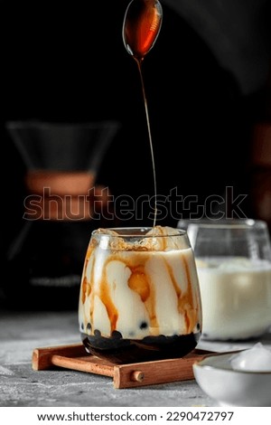 Homemade bubble tea with caramel and ice Royalty-Free Stock Photo #2290472797