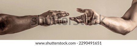Closeup help hand. Helping hand concept, support. Friendly handshake. Two hands, helping arm of a friend, teamwork. Rescue, helping gesture or hands. Royalty-Free Stock Photo #2290491651