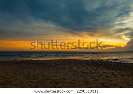 Beautiful tropical sunset landscape on the ocean.  Photography for tourism background, design and advertising.