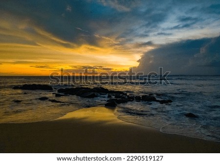 Beautiful tropical sunset landscape on the ocean.  Photography for tourism background, design and advertising.