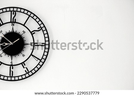 Wall clock placed in the left side of the background to create a black and white poster, template or texture for marketing or sales in business or time related services. Office to Start. 8:50 AM