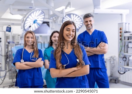 Medical professionals standing together. concept of health protection. Successful team of medical doctors are looking at camera and smiling while standing in hospital