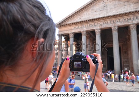 tourist girl taking picture of Pantheon in Rome, Italy