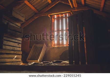 old attic of a house, hidden secrets Royalty-Free Stock Photo #229055245