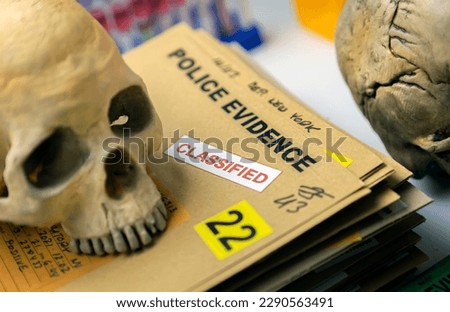 Skull adult person in murder investigation in a forensic laboratory, conceptual image Royalty-Free Stock Photo #2290563491