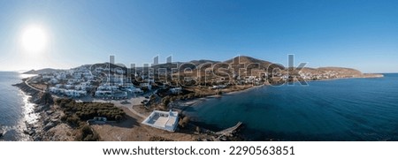 Tinos island, Cyclades Greece. Aerial drone panoramic view of Agios Sostis church beach, calm sea, blue sky. Summer sunny day. Banner