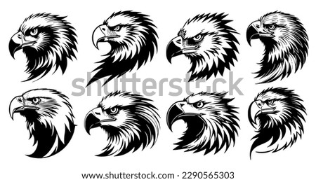 Set of eagle heads with big beaks, side view. Symbols for tattoo, emblem or logo, isolated on a white background. Royalty-Free Stock Photo #2290565303