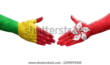 Handshake between Mali and Hong Kong flags painted on hands, isolated transparent image.