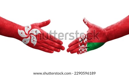 Handshake between Belarus and Hong Kong flags painted on hands, isolated transparent image.