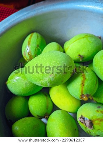 Green mango in a bowl