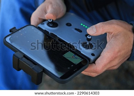 remote control and monitoring drone unmanned aerial vehicle Royalty-Free Stock Photo #2290614303